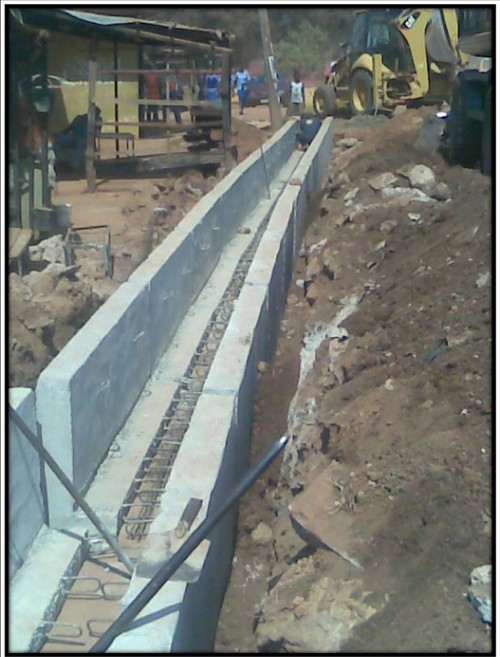 Concrete drainage channel under construction at College Road in Enugu