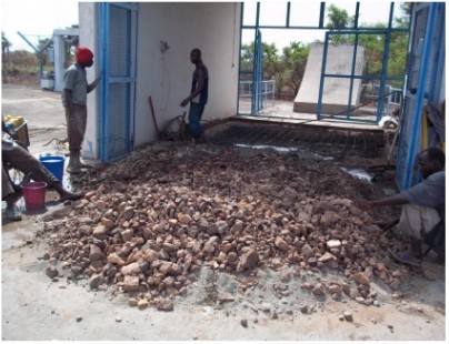 Workers preparing a floor during renovation works